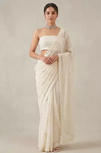 White embroidered georgette saree with unstitched blouse