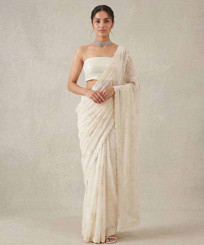 White embroidered georgette saree with unstitched blouse