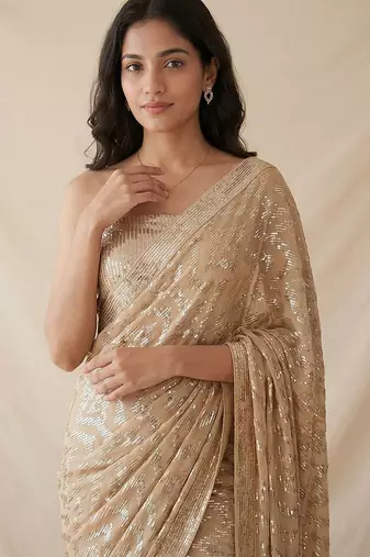 Gold embroidered georgette net blend saree with unstitched blouse