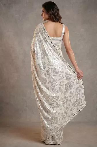 Ivory embroidered georgette saree with unstitched blouse