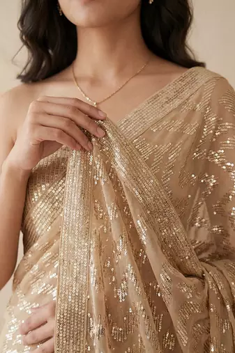 Gold embroidered georgette net blend saree with unstitched blouse