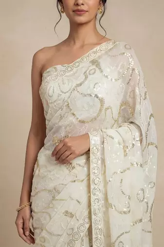 Ivory embroidered georgette saree with unstitched blouse