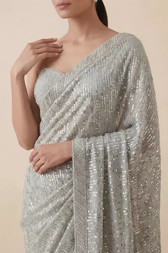 Grey embroidered georgette saree with unstitched blouse