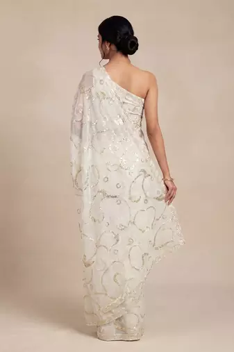 Ivory embroidered georgette saree with unstitched blouse