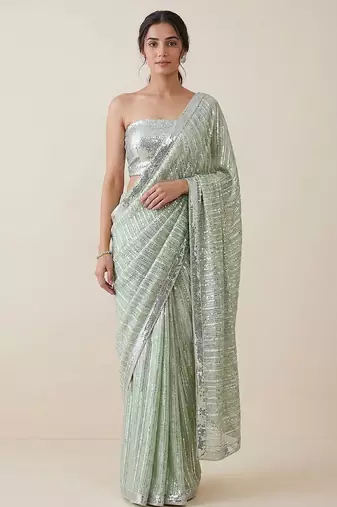 Mint green embroidered georgette saree with unstitched blouse