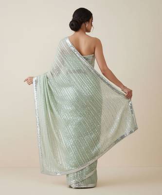 Mint green embroidered georgette saree with unstitched blouse 2
