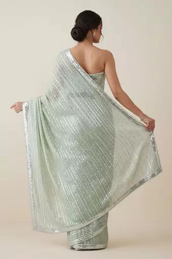 Mint green embroidered georgette saree with unstitched blouse