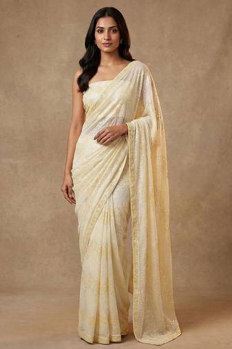 Yellow embroidered georgette saree with unstitched blouse