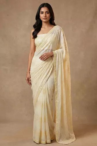 Yellow embroidered georgette saree with unstitched blouse