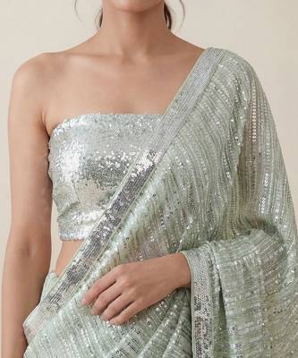 Mint green embroidered georgette saree with unstitched blouse 3