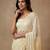 Yellow embroidered georgette saree with unstitched blouse