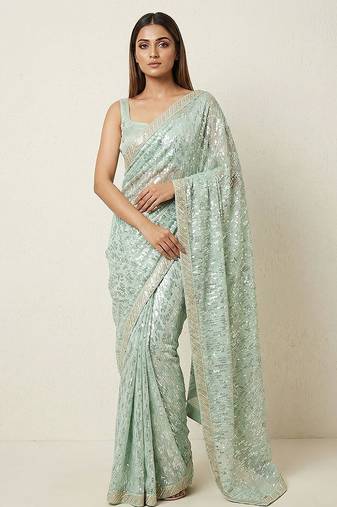 Green embroidered georgette saree with unstitched blouse