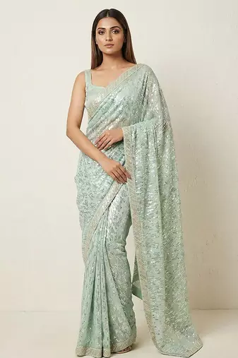 Green embroidered georgette saree with unstitched blouse