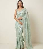 Green embroidered georgette saree with unstitched blouse