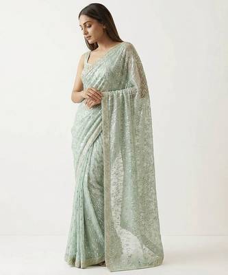 Green embroidered georgette saree with unstitched blouse 3