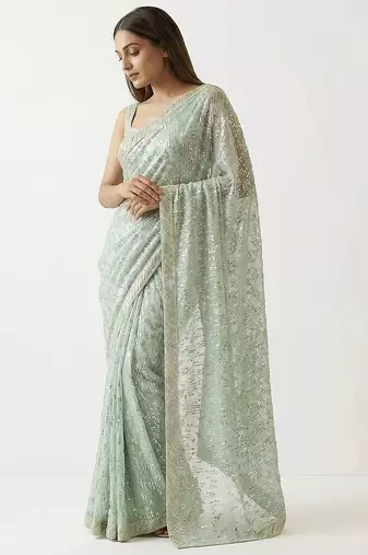 Green embroidered georgette saree with unstitched blouse