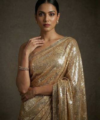 Gold embroidered shimmer georgette saree with unstitched blouse 4