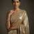 Gold embroidered shimmer georgette saree with unstitched blouse