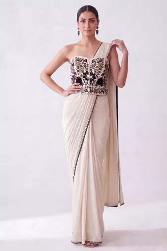 Cream embroidered lycra corset blouse and saree