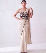 Cream embroidered lycra corset blouse and saree