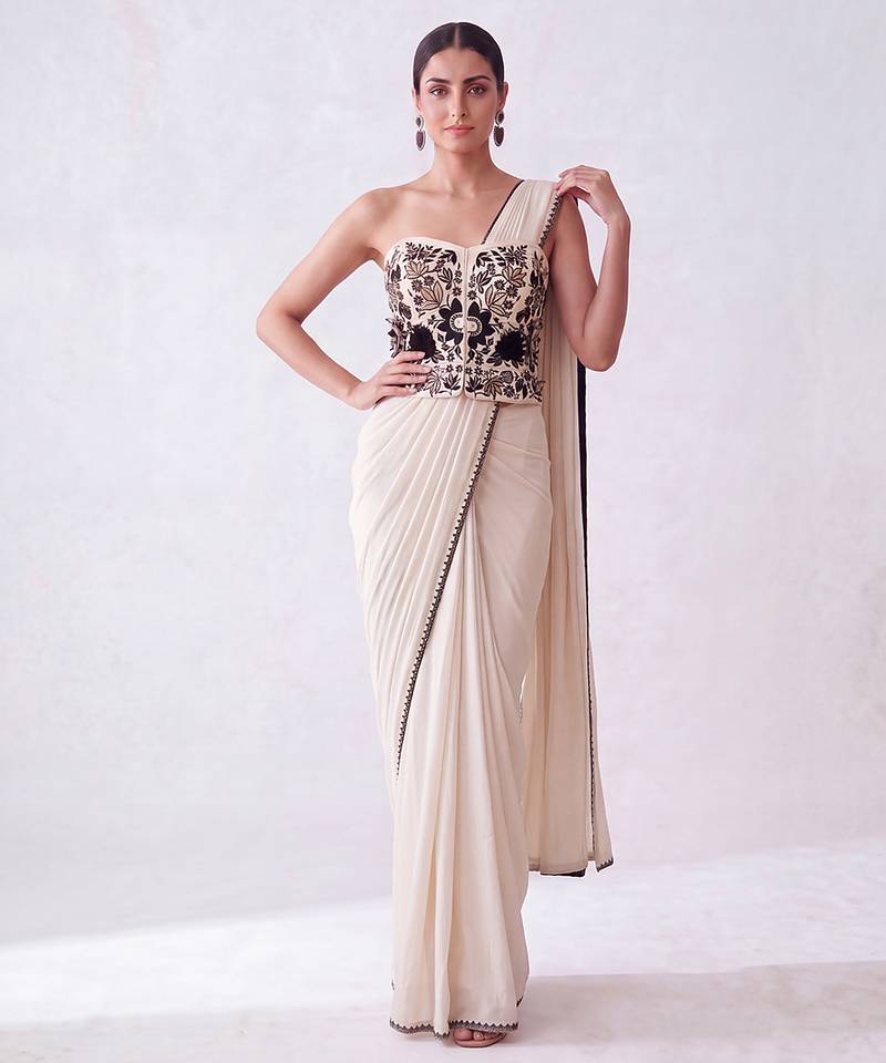 Cream embroidered lycra corset blouse and saree