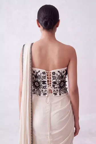 Cream embroidered lycra corset blouse and saree