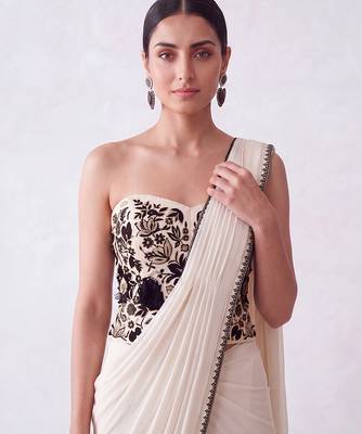 Cream embroidered lycra corset blouse and saree 4