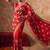 Red embroidered silk saree with unstitched blouse