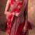 Red embroidered silk saree with unstitched blouse