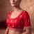 Red embroidered silk saree with unstitched blouse