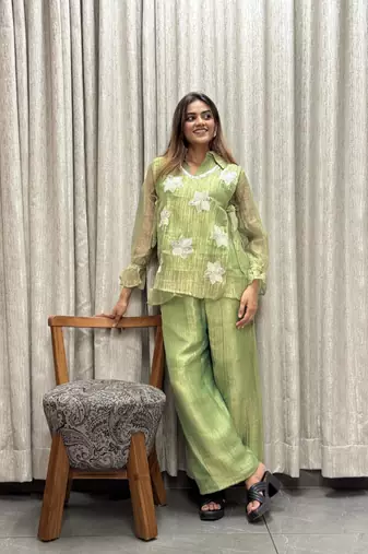 elegant green embroidered kurti palazzo set with floral detailing   premium ethnic wear for