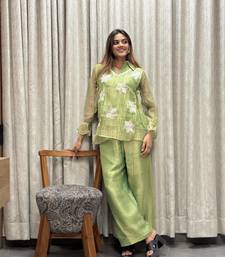 elegant green embroidered kurti palazzo set with floral detailing   premium ethnic wear for