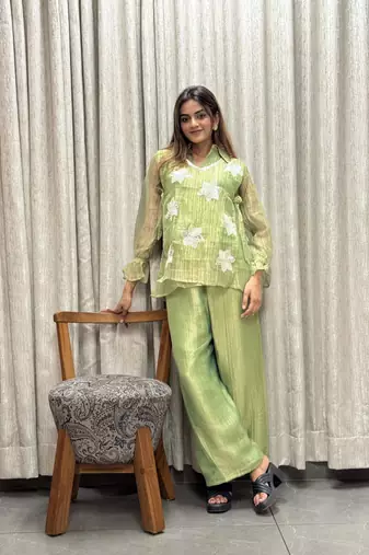 elegant green embroidered kurti palazzo set with floral detailing   premium ethnic wear for