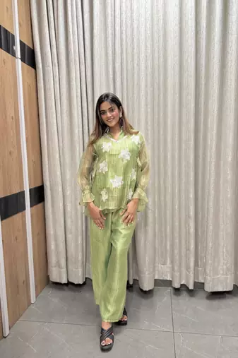 elegant green embroidered kurti palazzo set with floral detailing   premium ethnic wear for