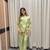 elegant green embroidered kurti palazzo set with floral detailing   premium ethnic wear for