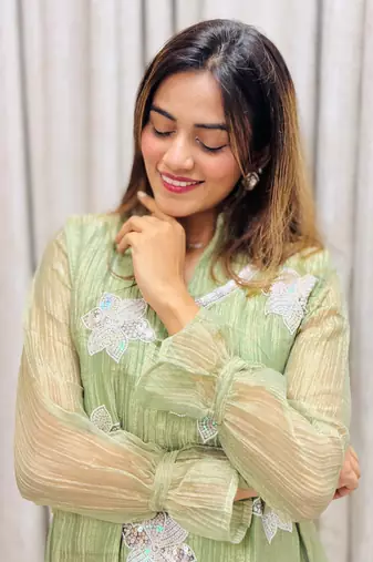 elegant green embroidered kurti palazzo set with floral detailing   premium ethnic wear for