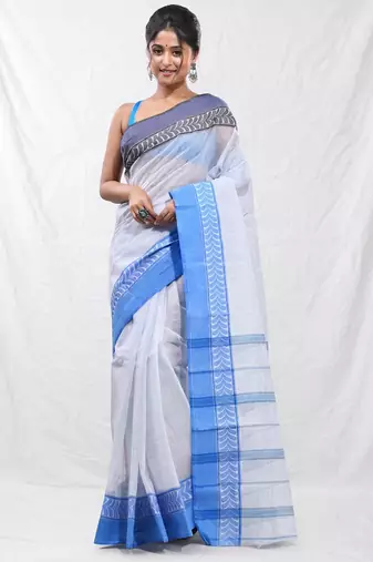 white cotton blend taant saree with woven designs