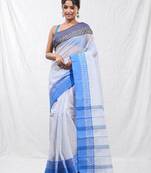 white cotton blend taant saree with woven designs