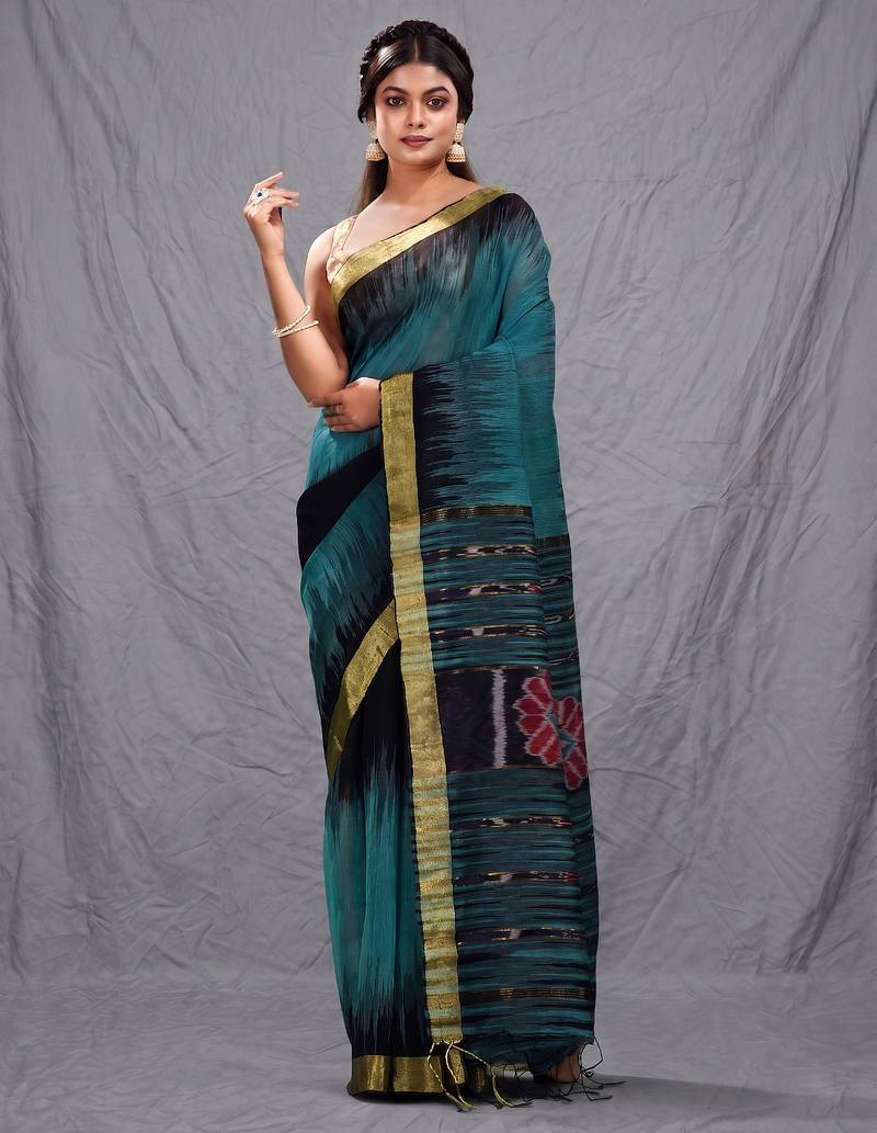 Teal blended cotton handwoven saree with ikkat design