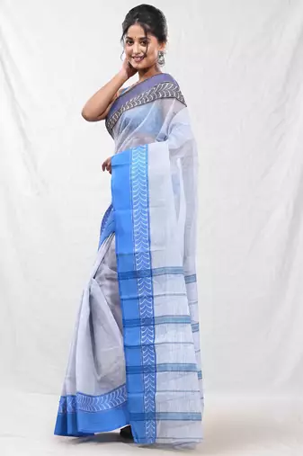 white cotton blend taant saree with woven designs
