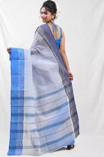 white cotton blend taant saree with woven designs