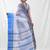 white cotton blend taant saree with woven designs