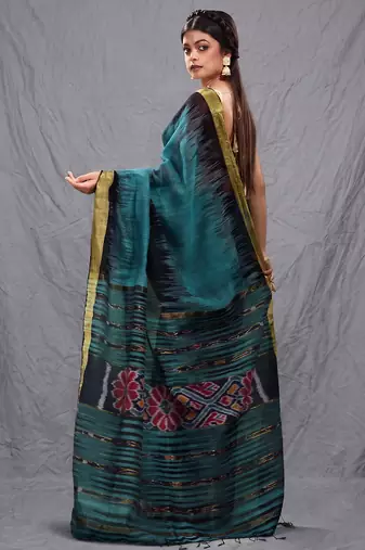 Teal blended cotton handwoven saree with ikkat design