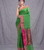 green cotton blend woven design soft saree with zari pallu