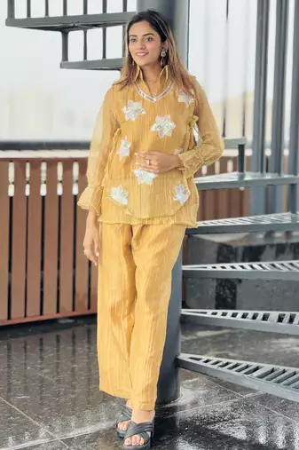 elegant mustard yellow embroidered kurti pant set with floral detailing   stylish women   ethnic wear