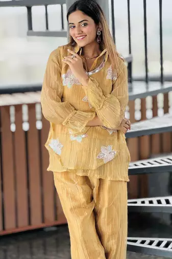 elegant mustard yellow embroidered kurti pant set with floral detailing   stylish women   ethnic wear