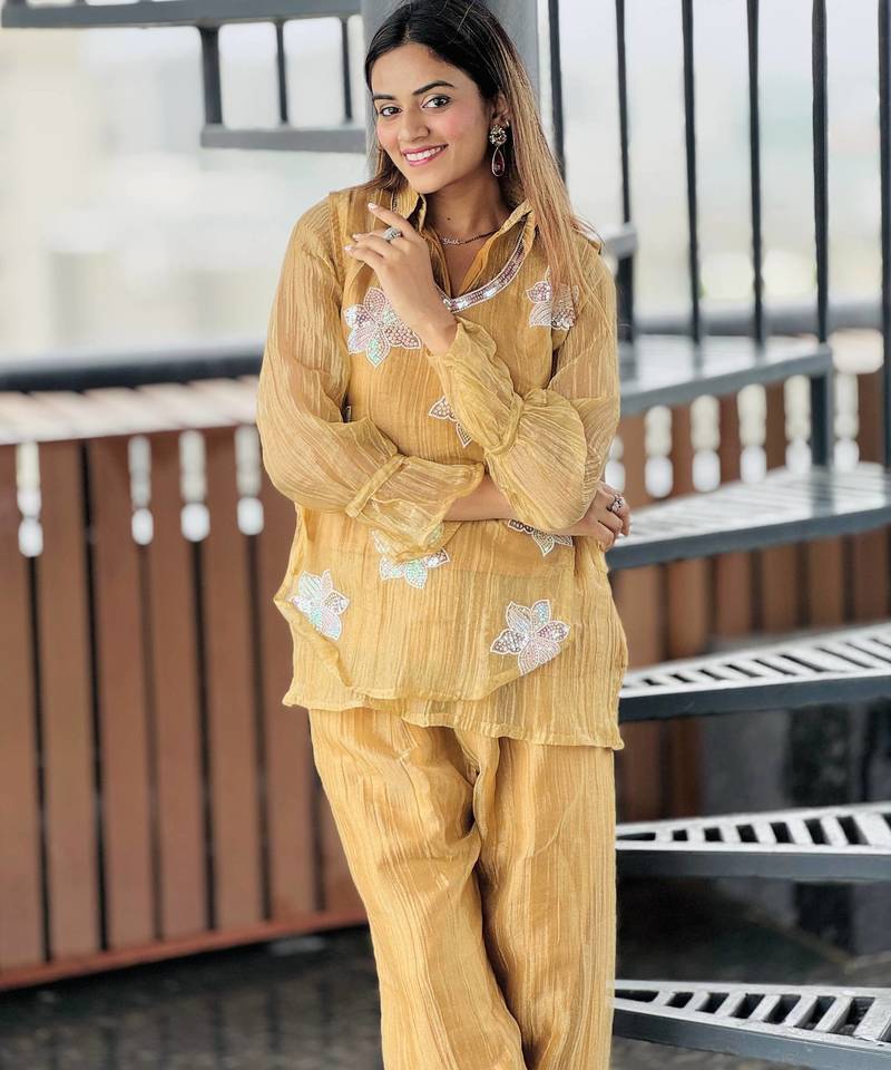 elegant mustard yellow embroidered kurti pant set with floral detailing   stylish women   ethnic wear