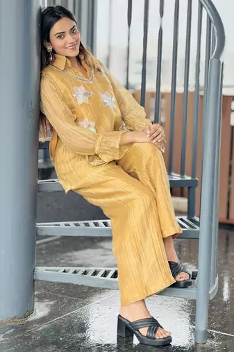 elegant mustard yellow embroidered kurti pant set with floral detailing   stylish women   ethnic wear