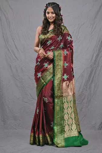 maroon embroidered motifs silk blend saree with zari borders
