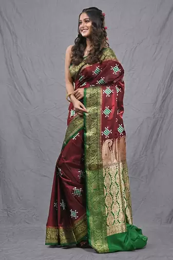 maroon embroidered motifs silk blend saree with zari borders